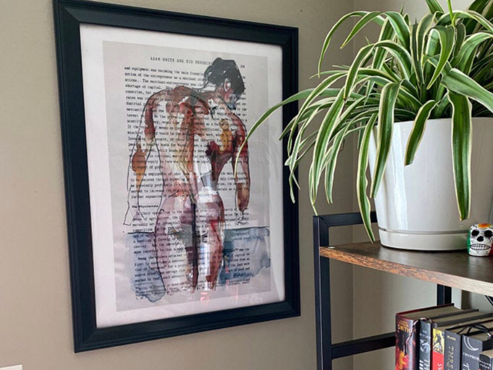 Framed watercolor of a male figure seen from behind, painted on a book page by Brenden Sanborn